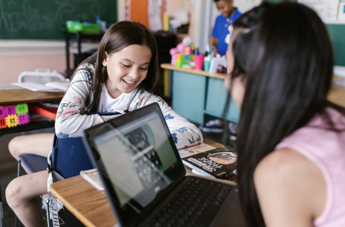 Nowadays, everyone uses laptops in classrooms to assist with their learning. Photo by RDNE Stock project via Pexels.