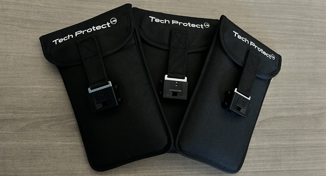 The school-issued pouches include both Velcro and a lock. 