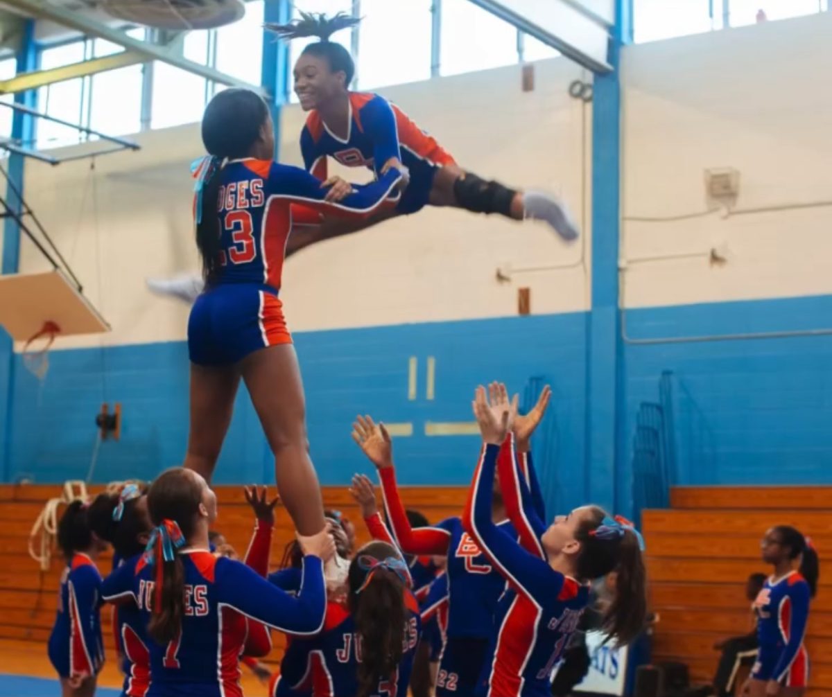 Cheerleaders at Cardozo are held to a high standard of not just being a student athlete, but also spreading school pride and spirit. Photo from Instagram @cardozocheer_stunt.