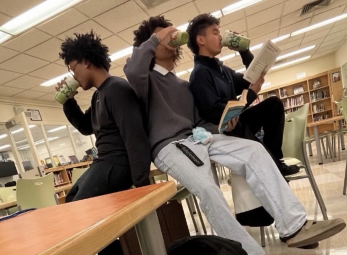 Teens have begun taking part in the latest TikTok trend, wearing the sweaters and acting in a more professional manner. Photo via Instagram @cardozoseniors.