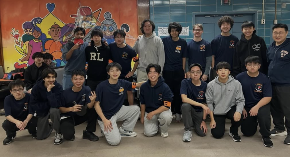 Boys Table Tennis Team celebrate their win against Flushing High School. Photo via Instagram @cardozotabletennis.