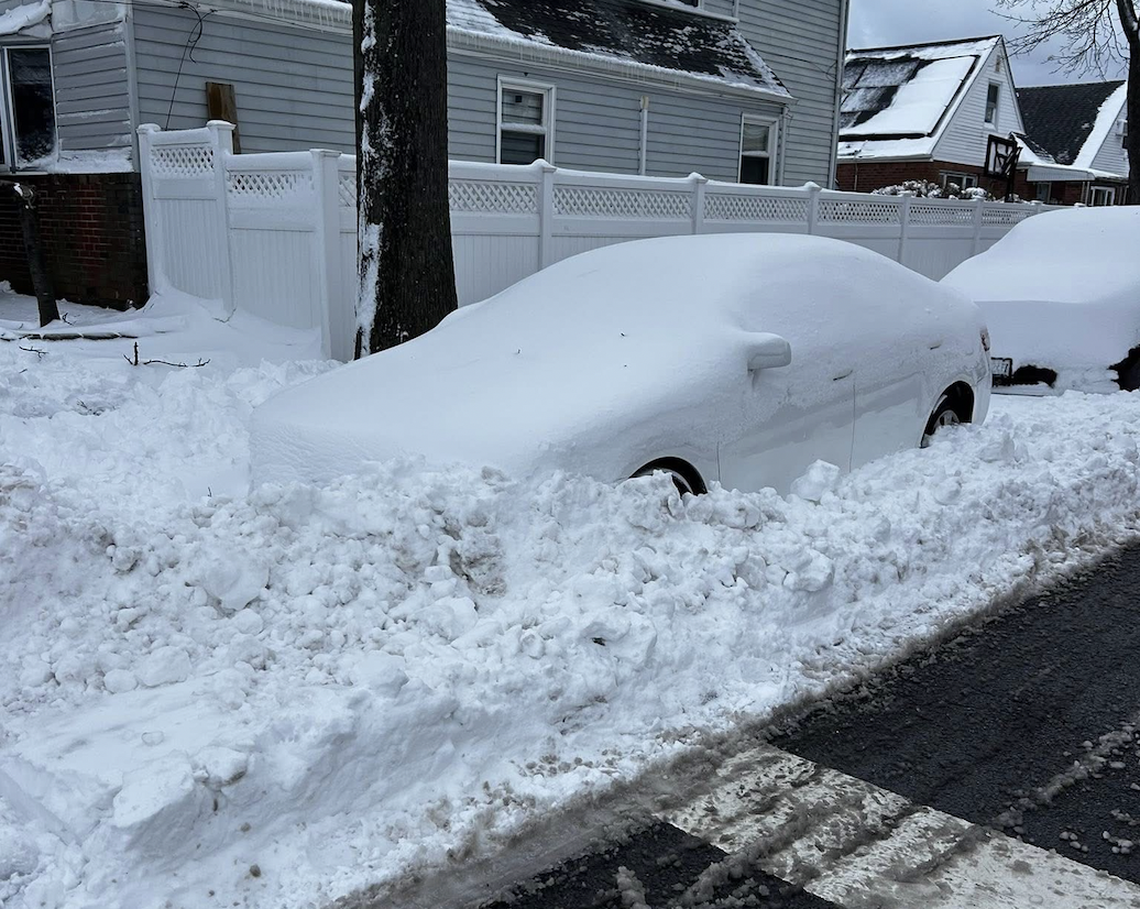 With many cars and streets buried under snow, parents, teachers, and students worried how they will commute to school. Photo via Facebook Bayside, Queens. 