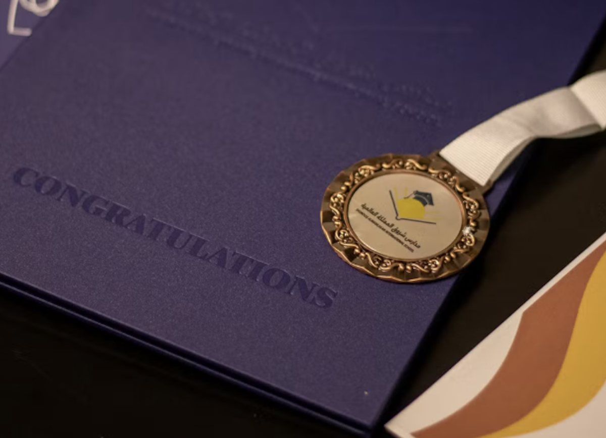 Medals and cords begin to lose their meaning as more schools prohibit them from being worn at graduation. Photo by Abdullah Gouiaa via Pexels.